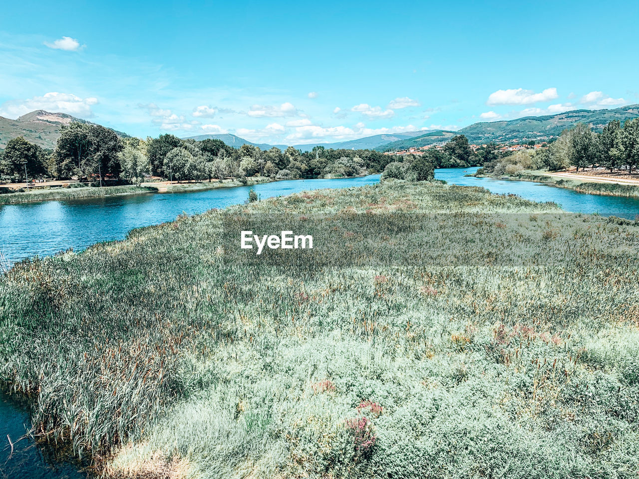 Scenic view of lake against sky