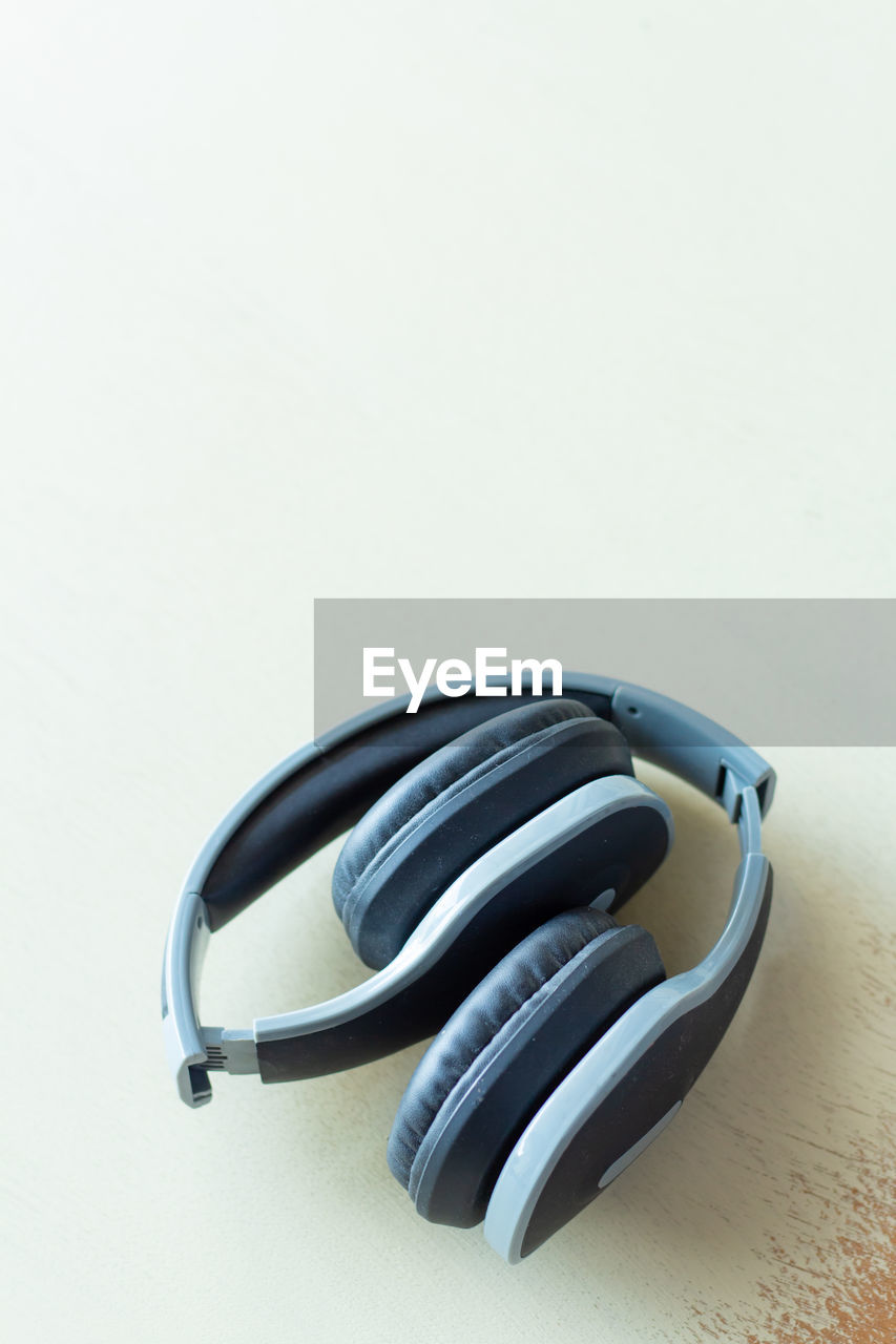 High angle view of headphones on white background