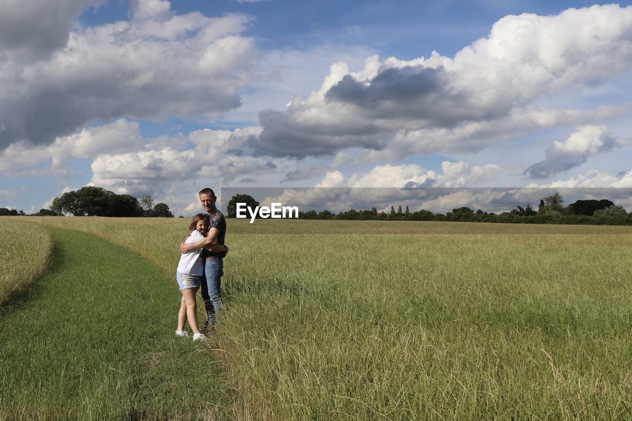 Full length of man on field against sky