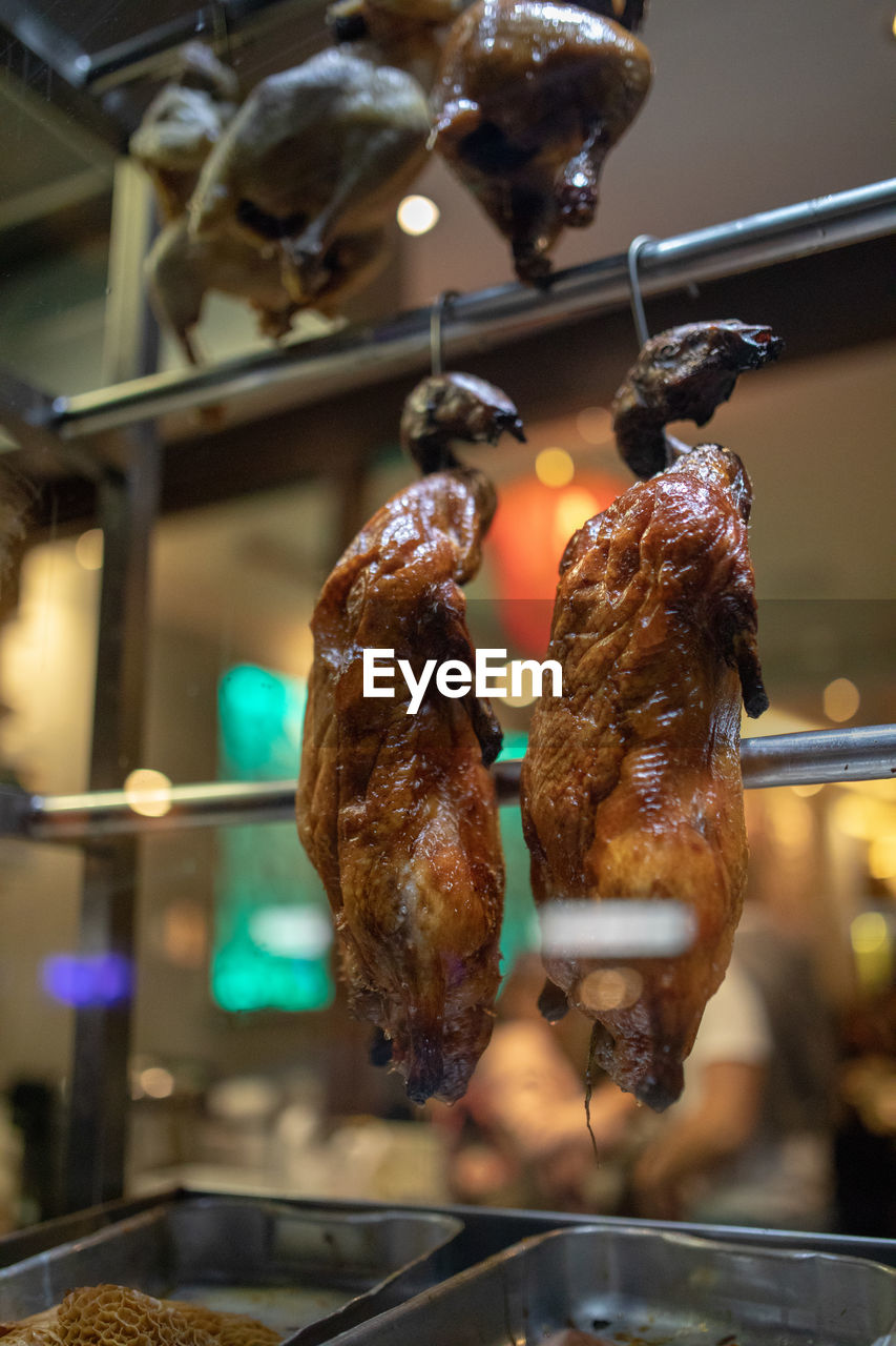 CLOSE-UP OF MEAT FOR SALE AT MARKET