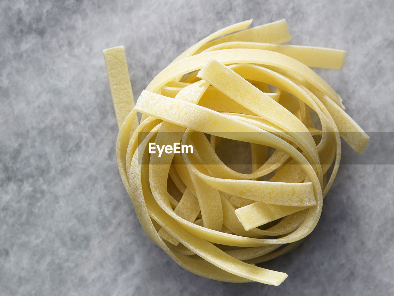 High angle view of tagliatelle pasta on table