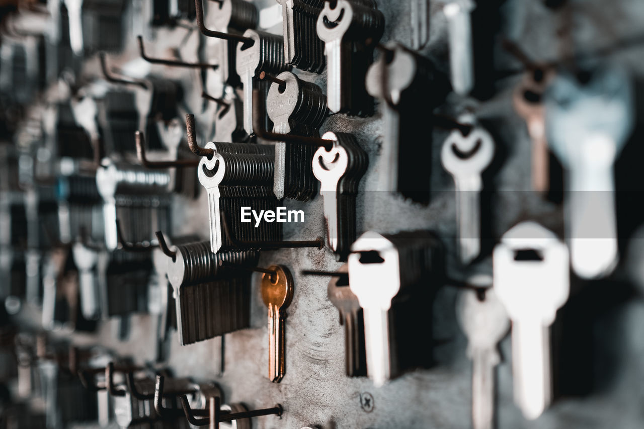 Close-up of keys hanging on wall