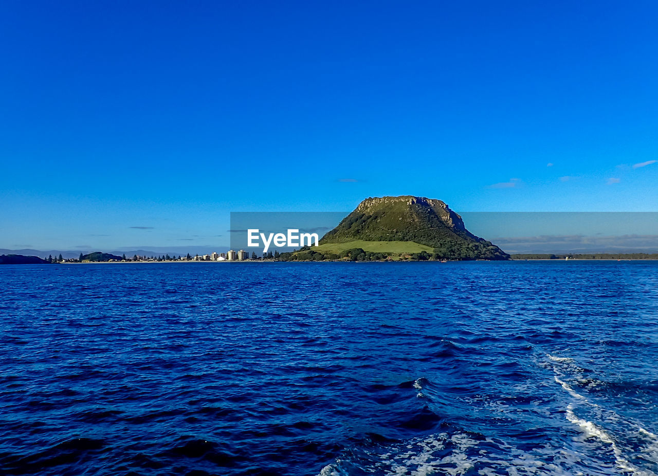 SCENIC VIEW OF BLUE SEA AGAINST CLEAR SKY