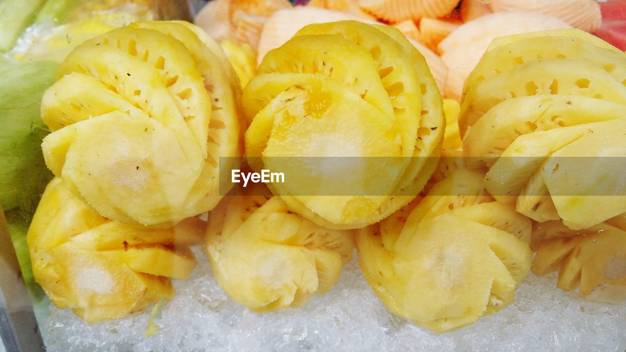 CLOSE-UP OF FRESH YELLOW AND BREAD