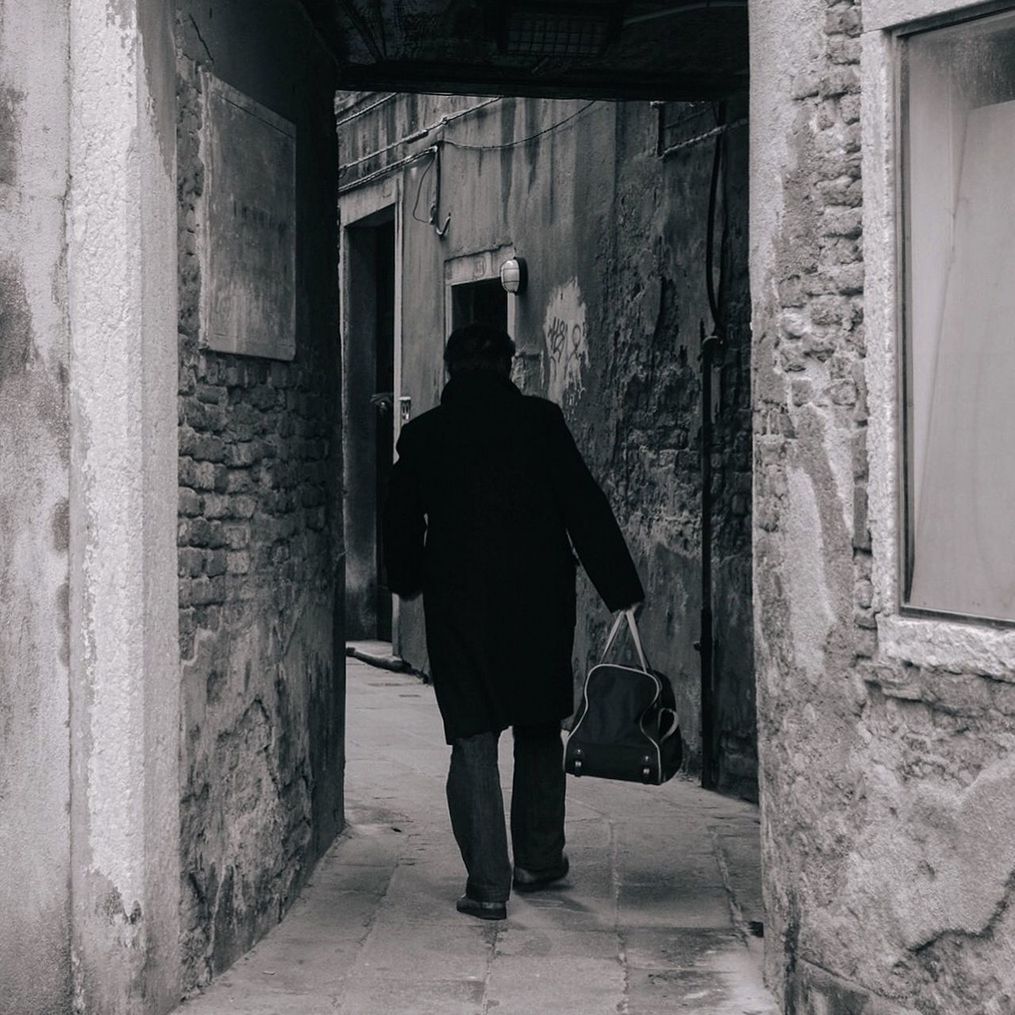 Full length of man walking on street