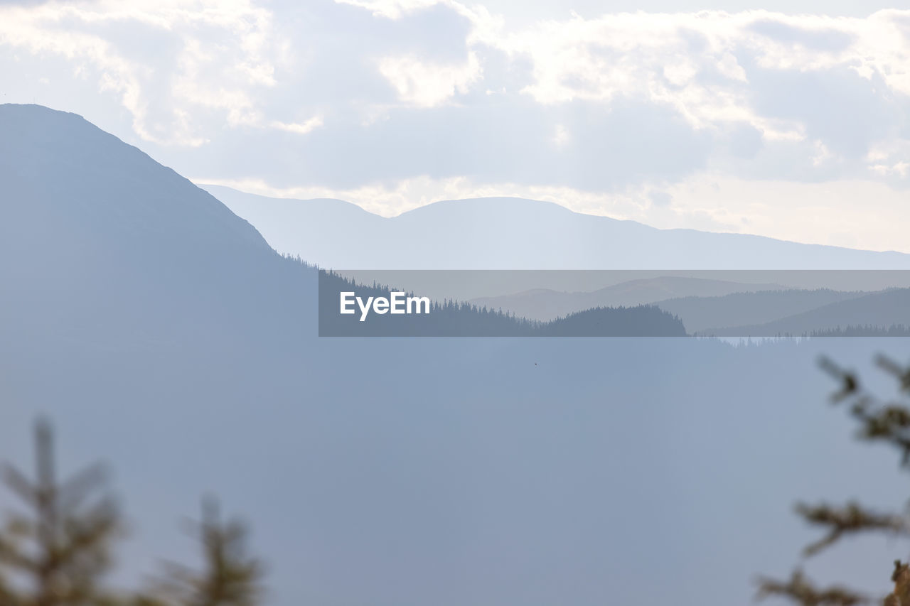 LOW ANGLE VIEW OF MOUNTAIN AGAINST SKY