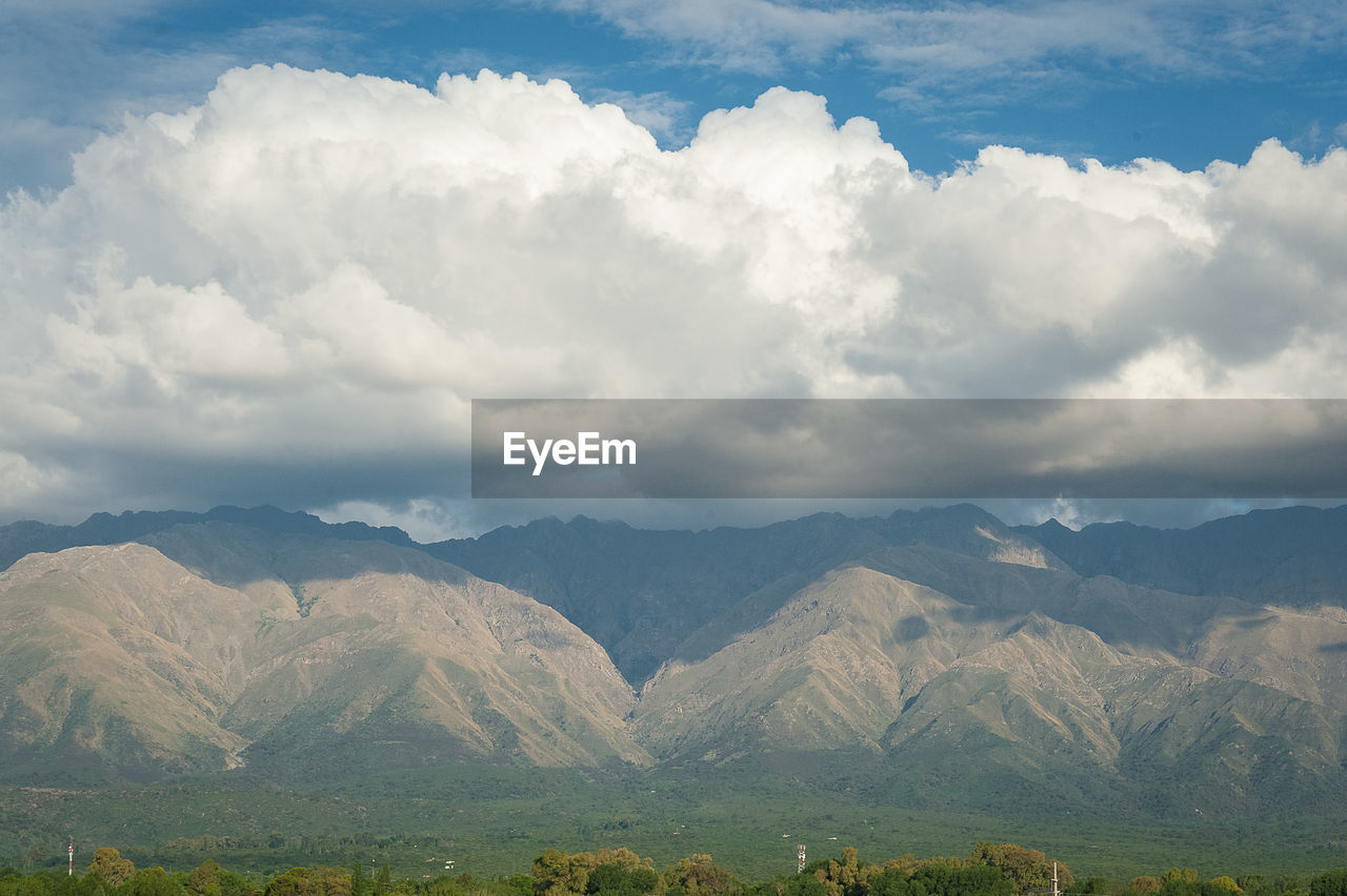 SCENIC VIEW OF MOUNTAIN RANGE AGAINST SKY