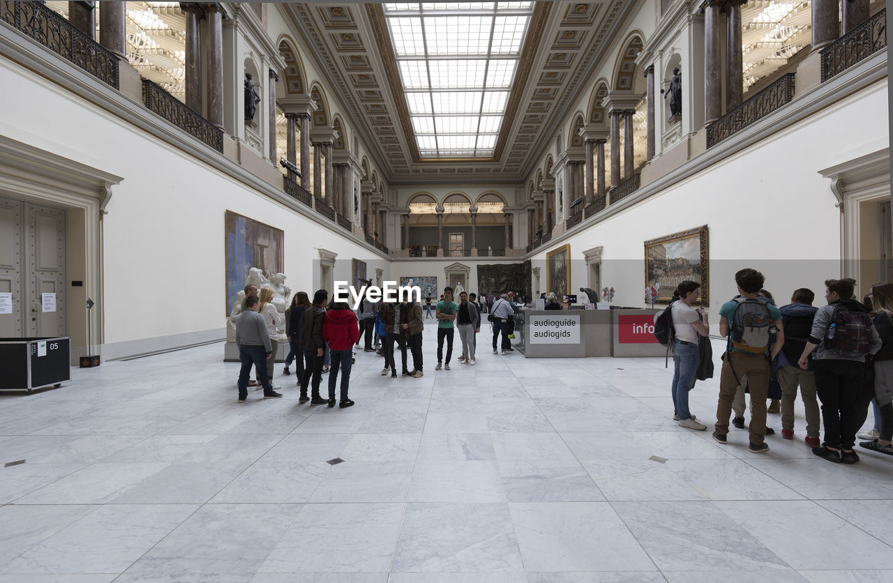 PEOPLE WALKING IN BUILDING