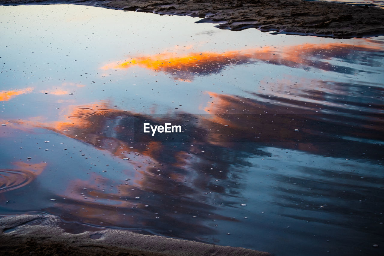 High angle view of sea against sky during sunset