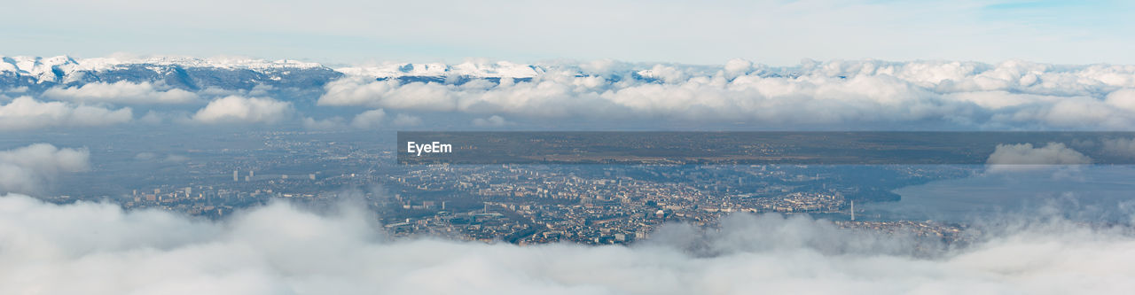 Panoramic shot of cityscape against sky