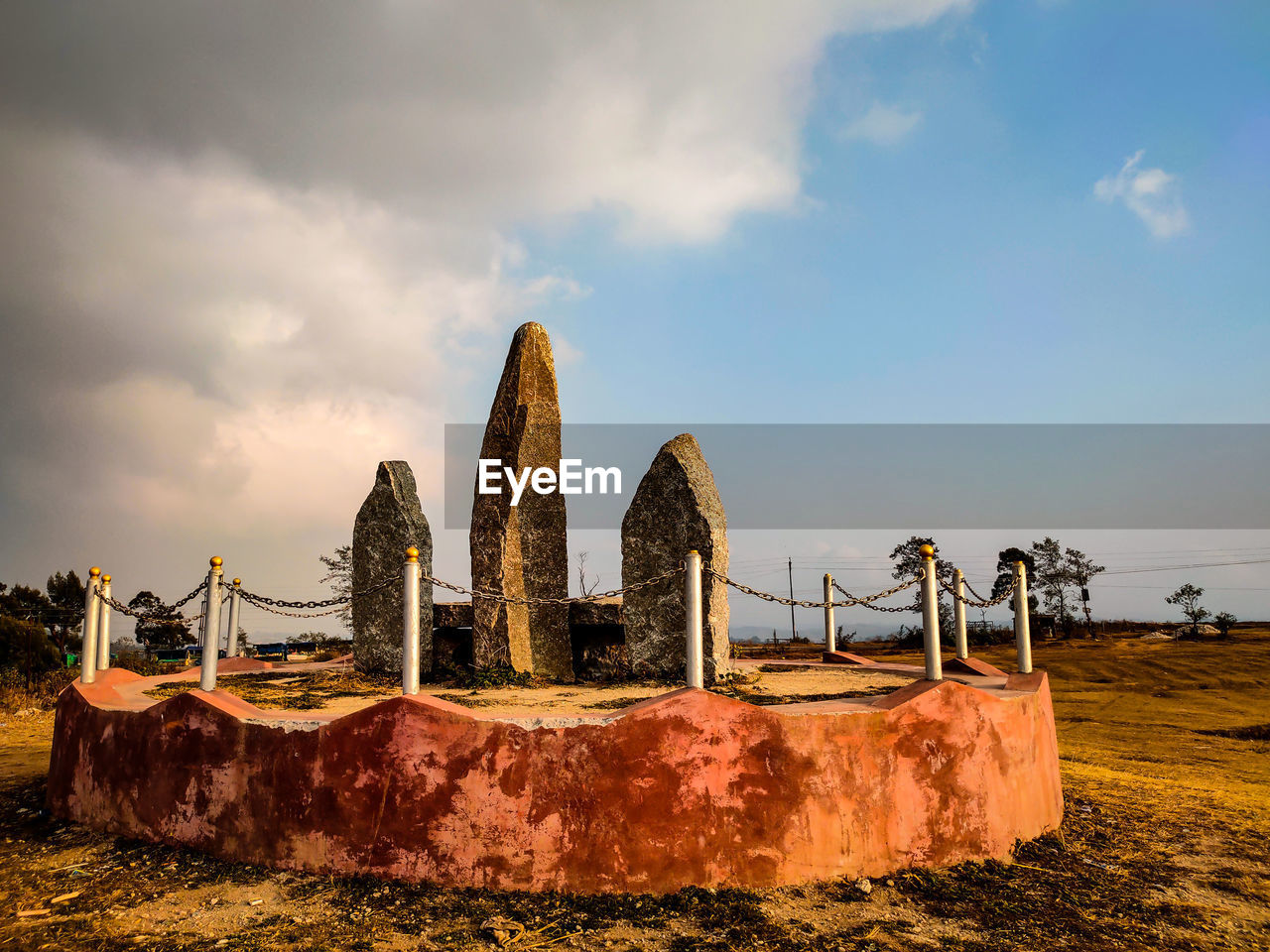 Panoramic view of old ruin on field against sky