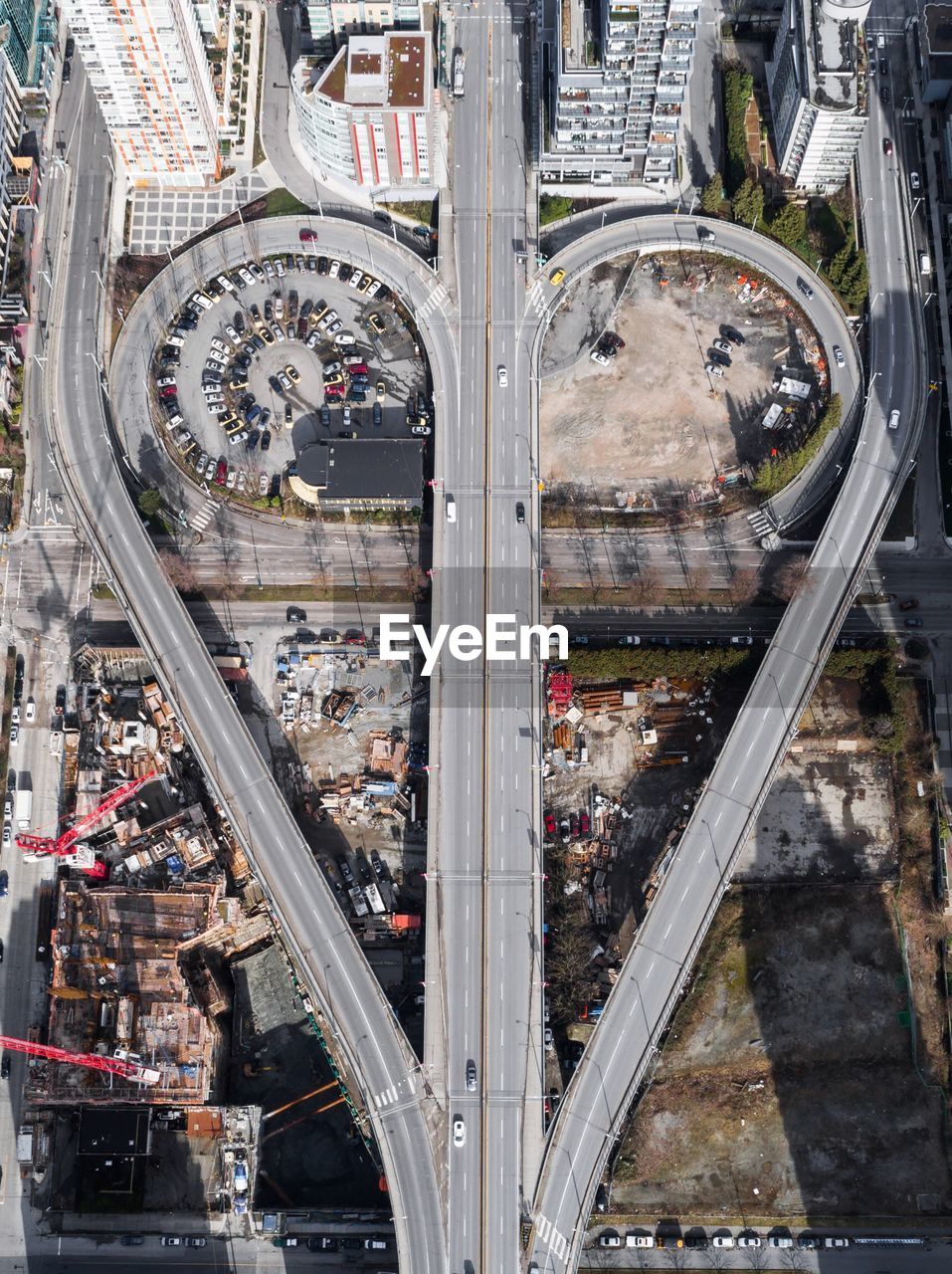 Aerial view of city street during sunny day