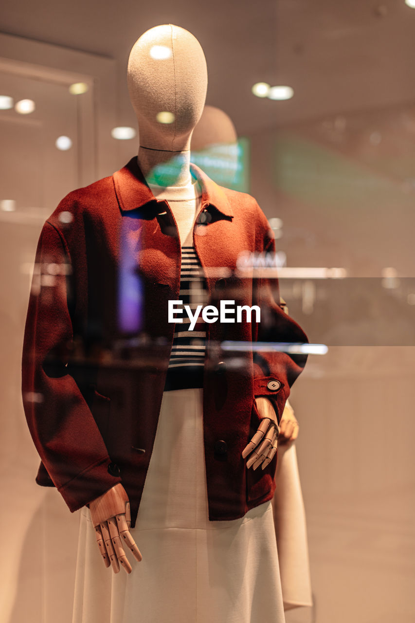 Brown jacket fashion details. casual women's fashion cloth and accessories on a mannequin