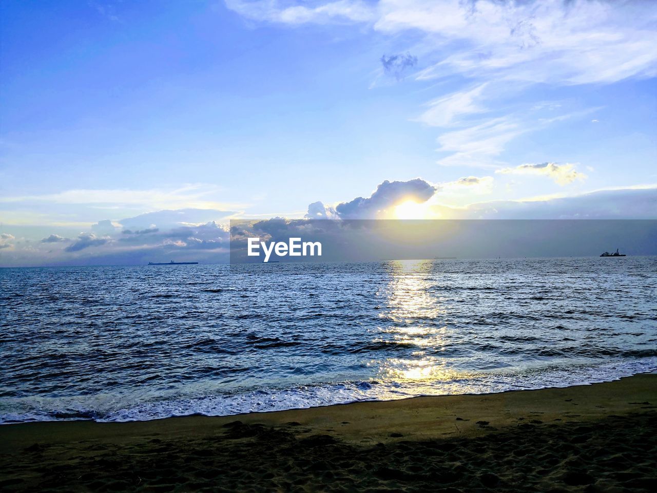 SCENIC VIEW OF SEA DURING SUNSET