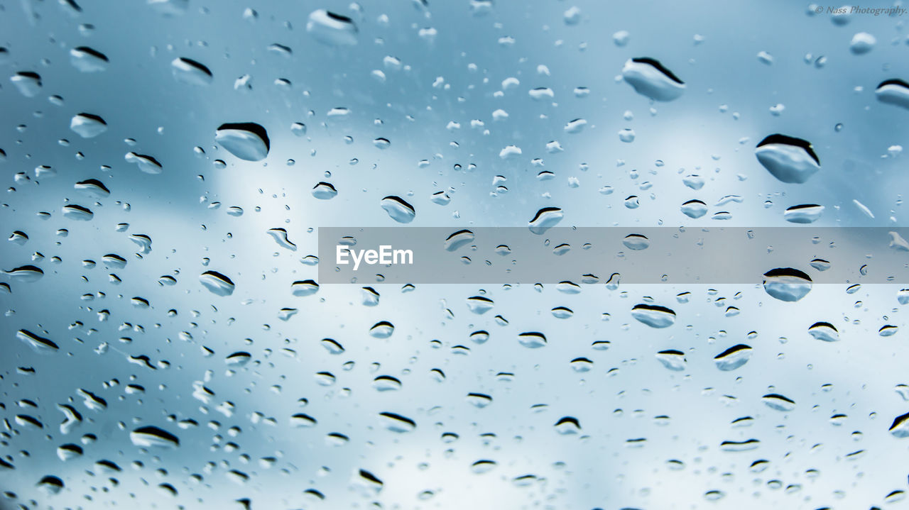 Close-up of water drops on glass window