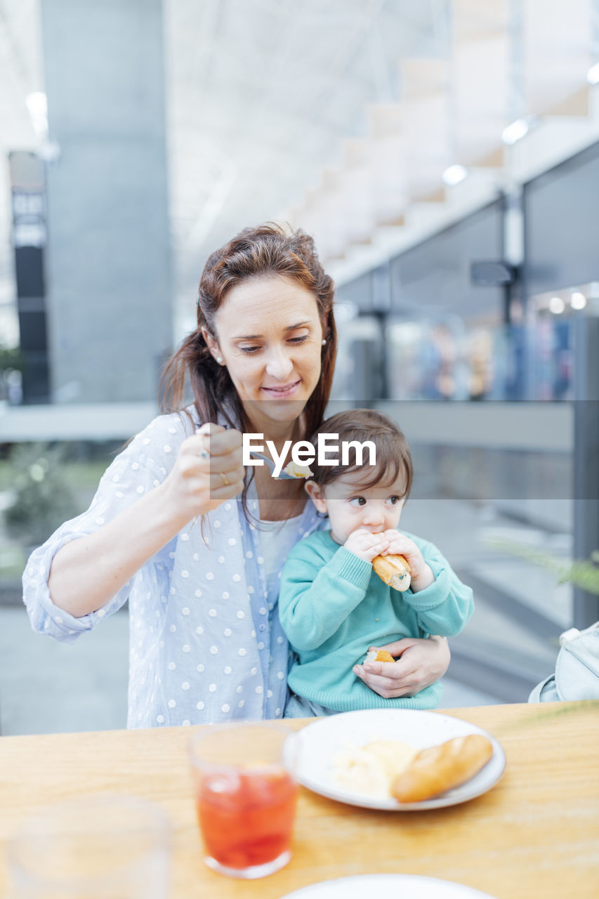 Mother and daughter with ice cream