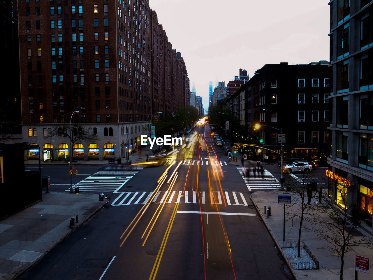 Illuminated city street at night