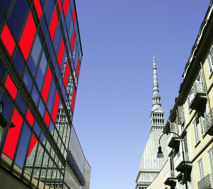 LOW ANGLE VIEW OF MODERN BUILDINGS AGAINST CLEAR SKY