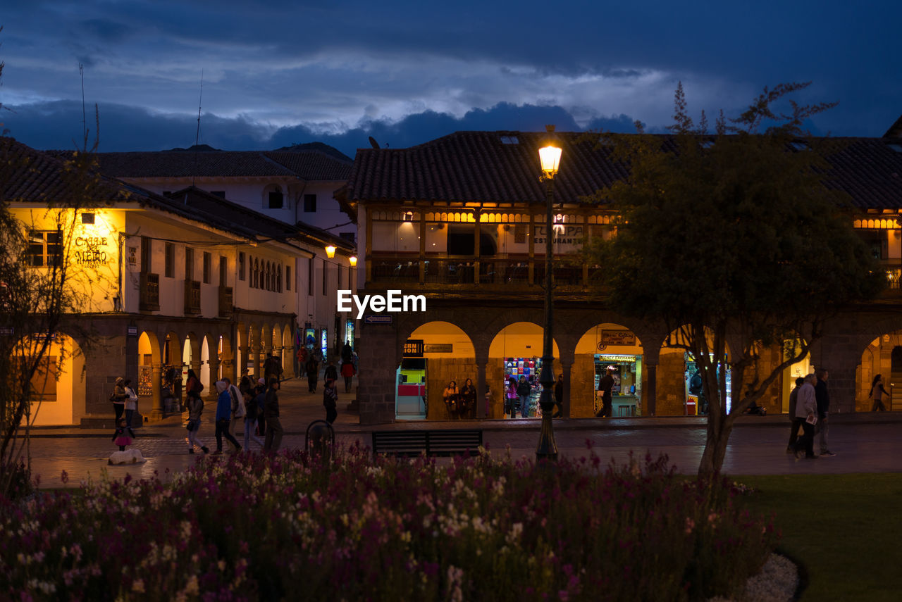 NIGHT VIEW OF ILLUMINATED STREET LIGHT IN CITY