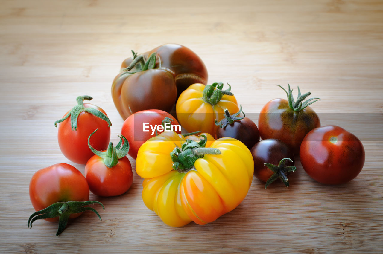 Close-up of various tomatoes on table