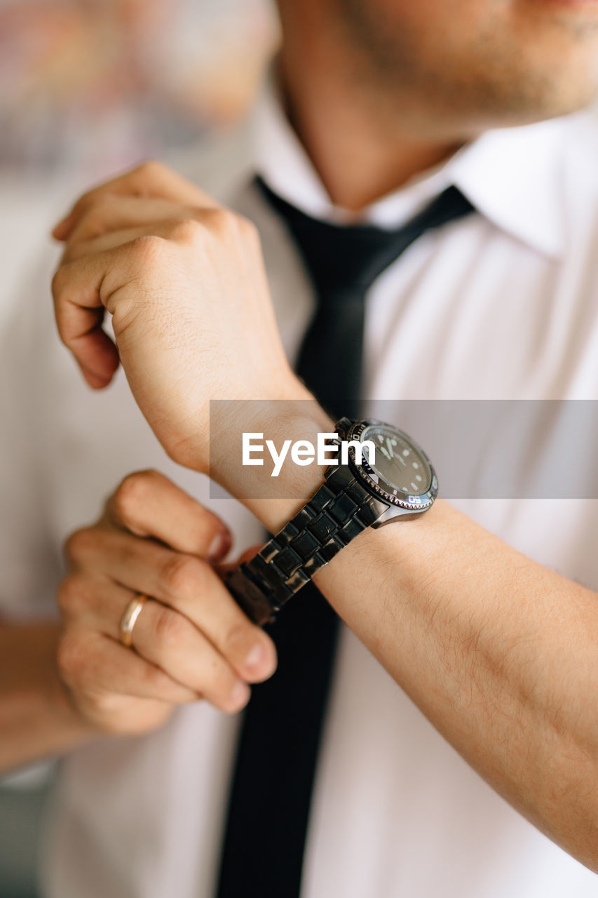 Man wearing wrist watch