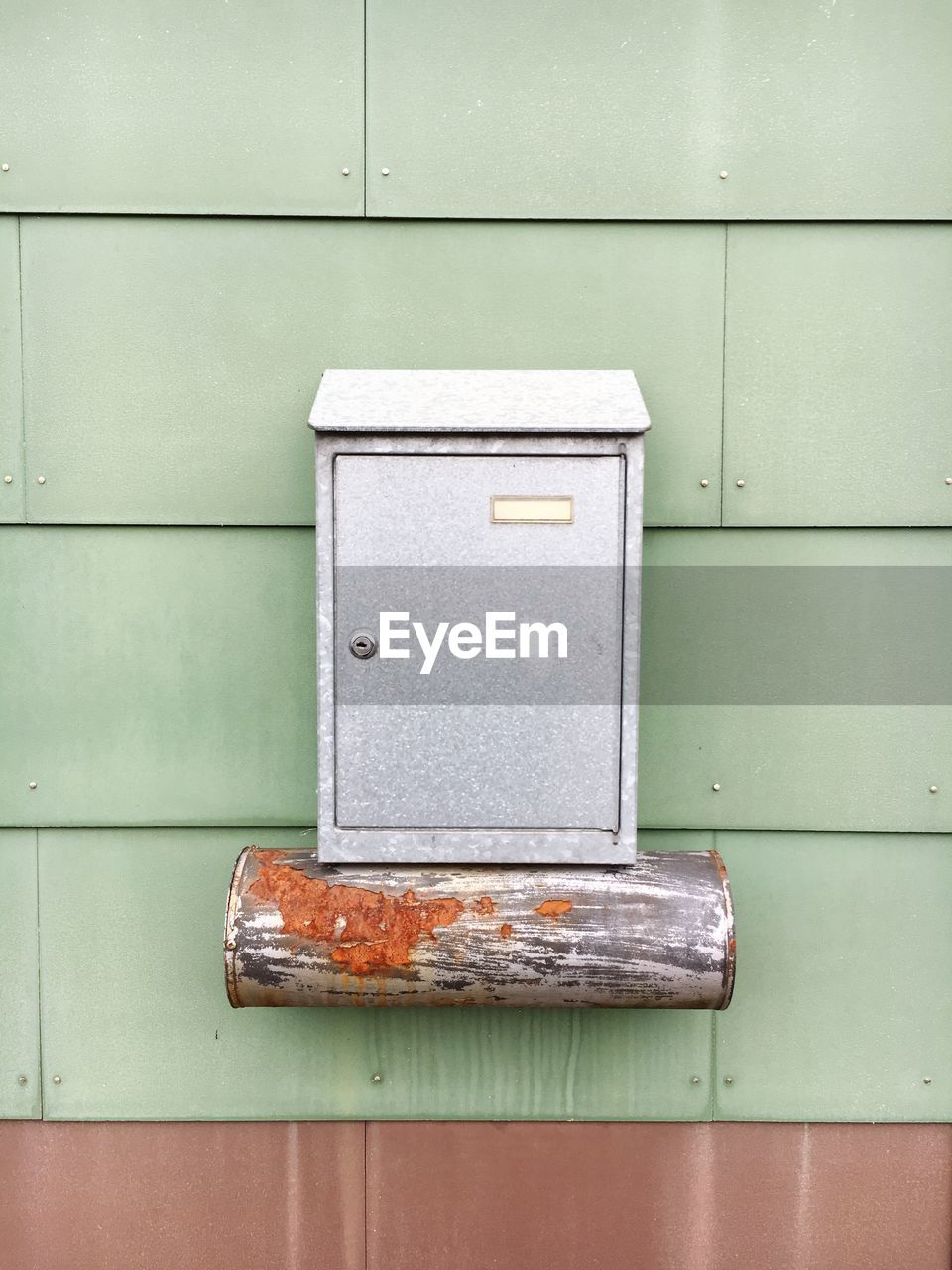 Mailbox on house wall