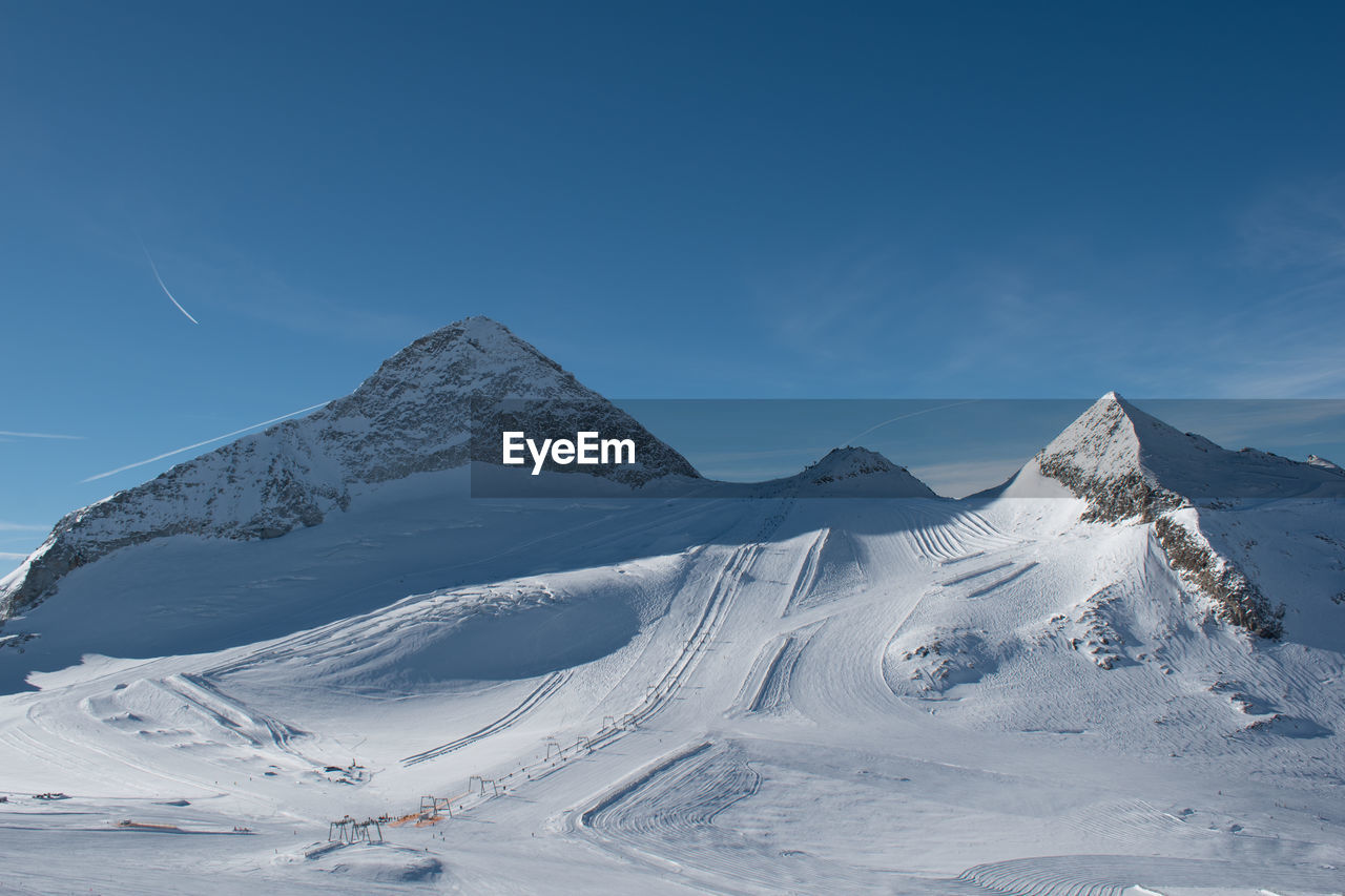 Hintertux glacier panorama on a sunny winter day. snowy background panorama, white winter scenery.