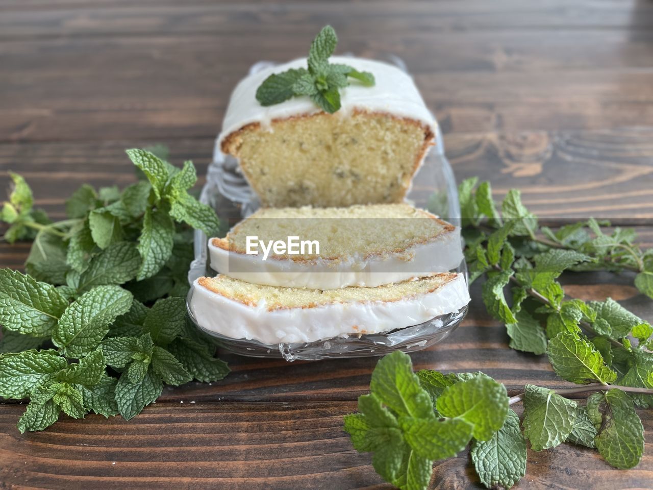 food, food and drink, wood, freshness, healthy eating, leaf, herb, plant part, dish, baked, dessert, dairy, wellbeing, no people, produce, indoors, mint leaf - culinary, sweet food, vegetable, fast food, cake, birthday cake, table, plant, green, sweet, studio shot, fruit, nature, garnish