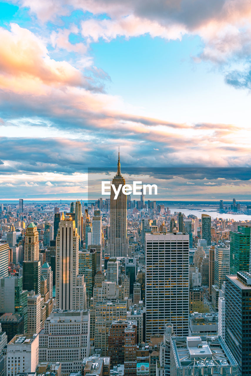 Aerial view of manhattan skyline at sunset, new york city. helicopter view