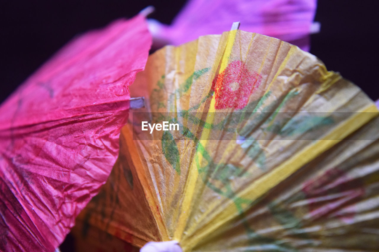 Close-up of paper drink umbrellas