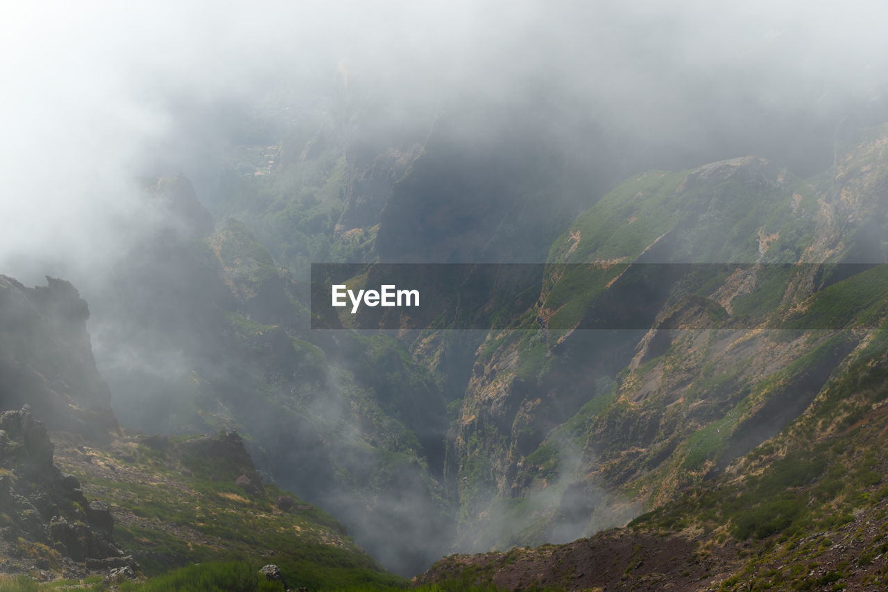 Scenic view of mountains against sky