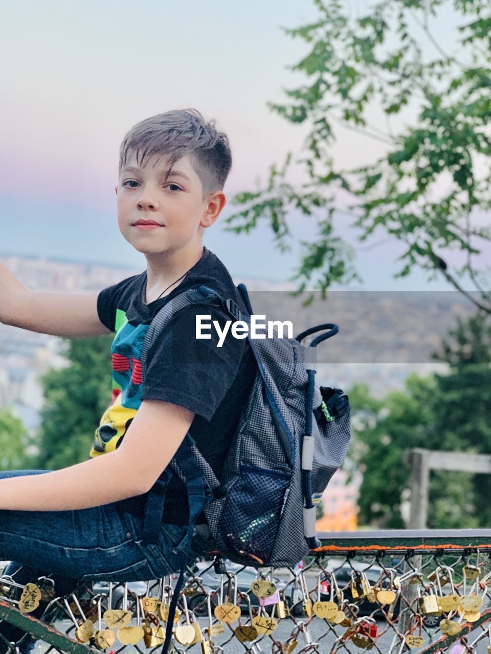 Portrait of boy looking away outdoors