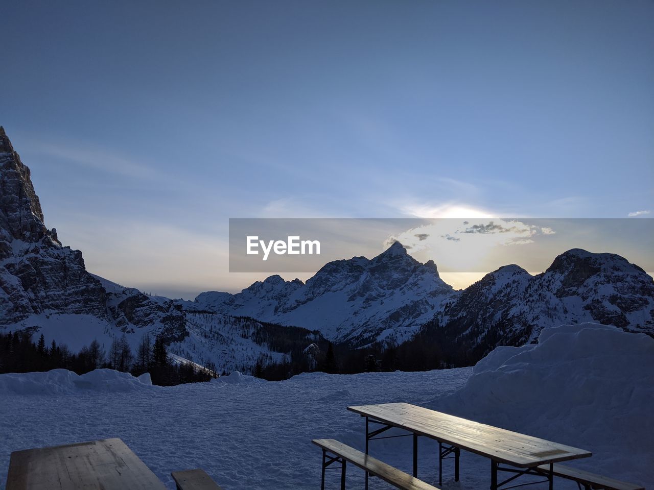Scenic view of snowcapped mountains against sky during winter from a shelter