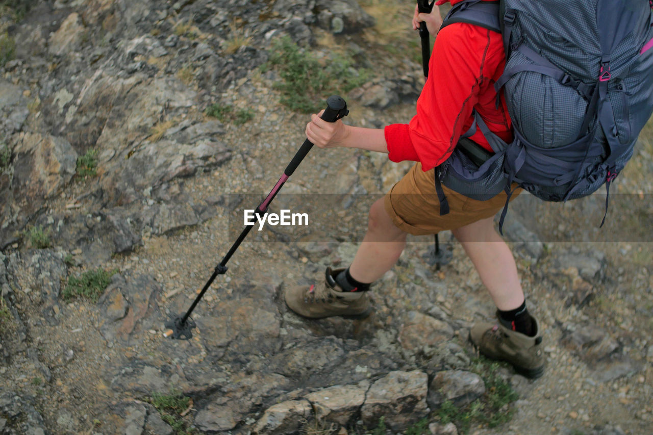 Low section of hiker on rocky mountain