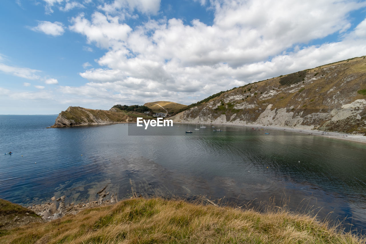 Landscape photo of lulworth cove in dorset.