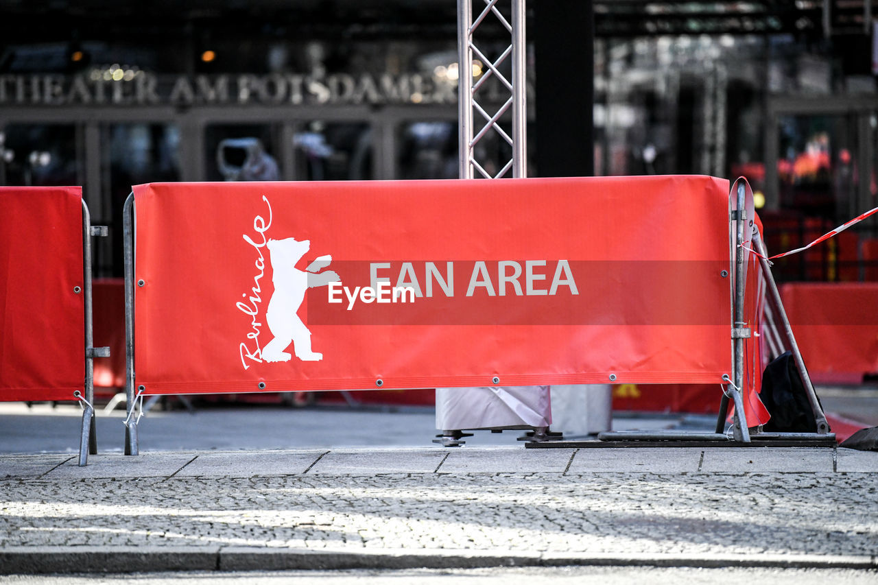 RED ROAD SIGN ON STREET