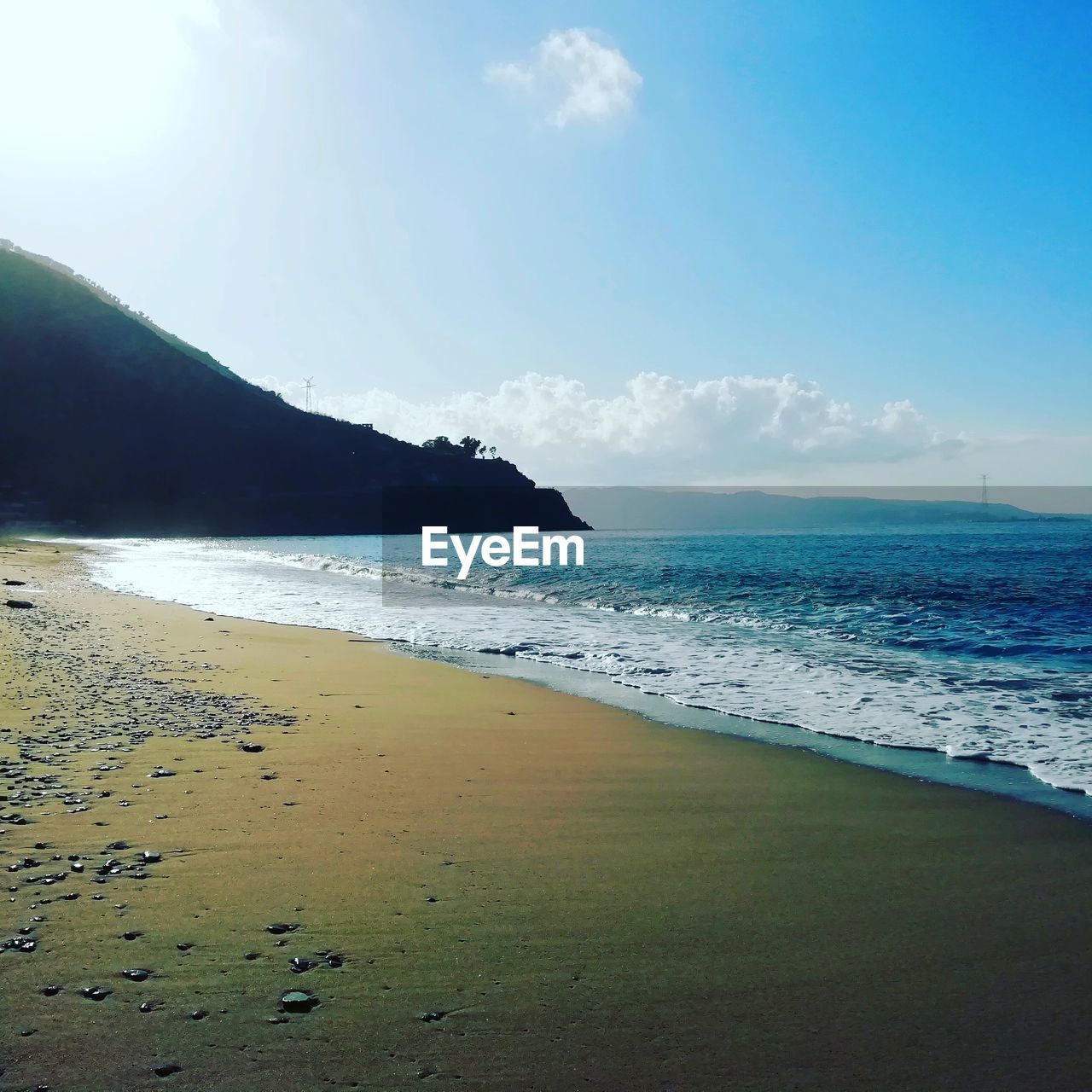 SCENIC VIEW OF BEACH BY SEA AGAINST SKY