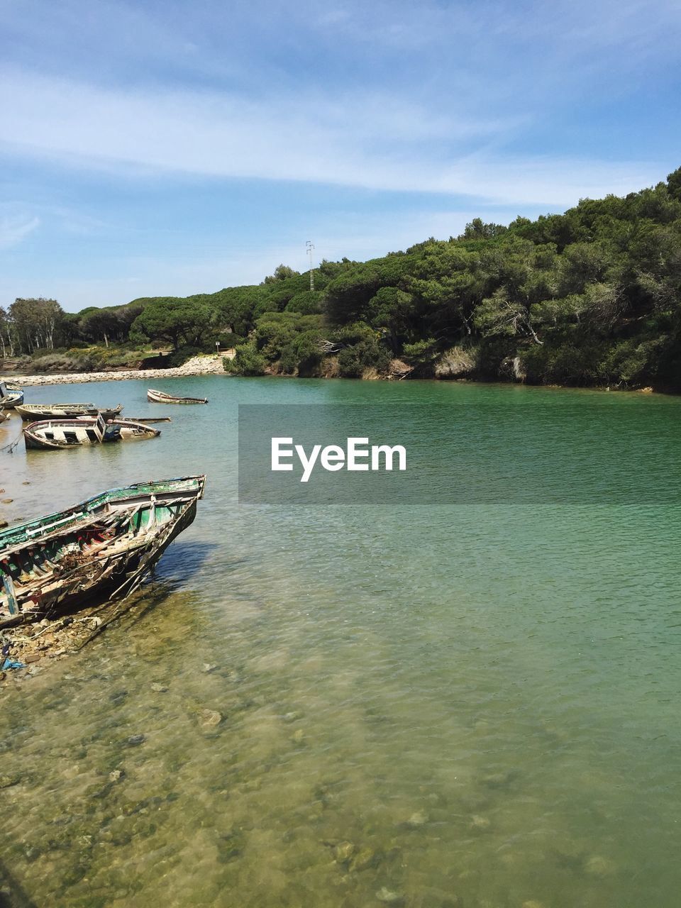 Calm lake against landscape