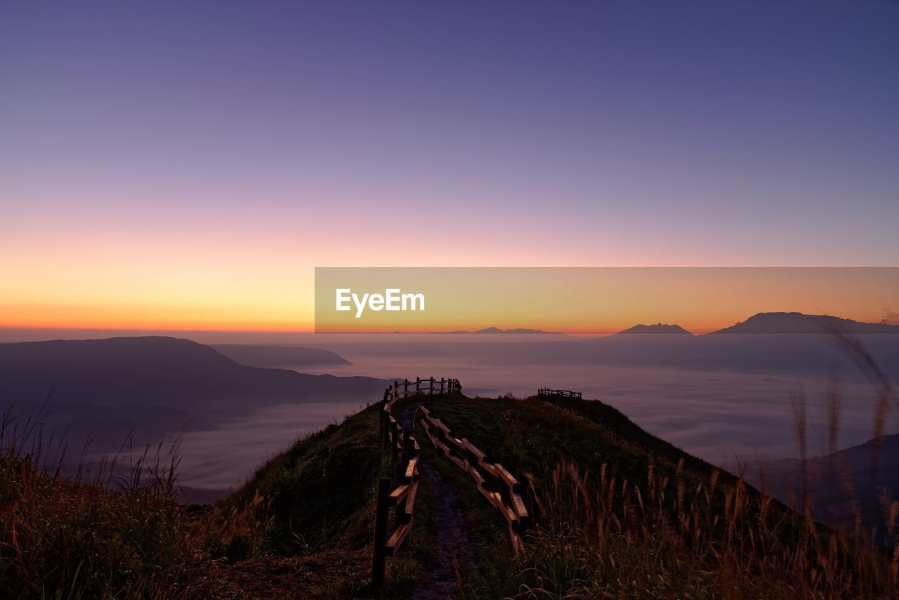 Scenic view of mountains against sky during sunset