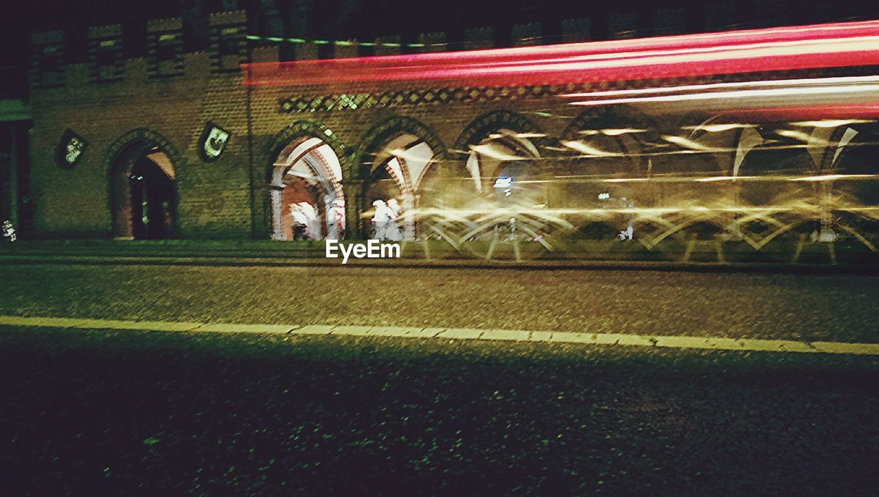 Light trails on street in city at night