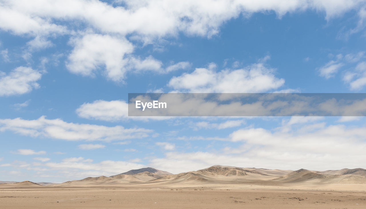 Scenic view of desert against sky