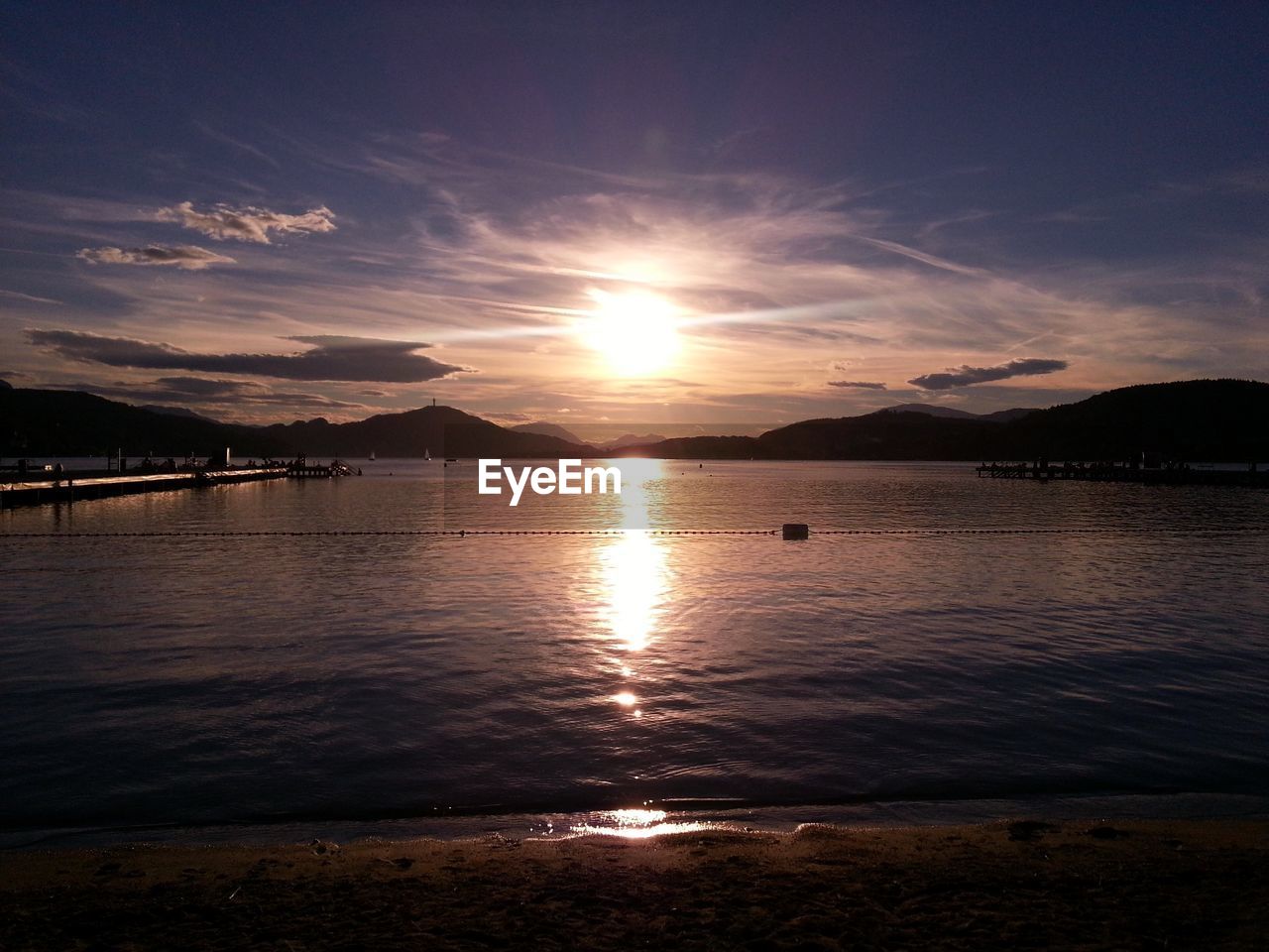 SCENIC VIEW OF SEA DURING SUNSET