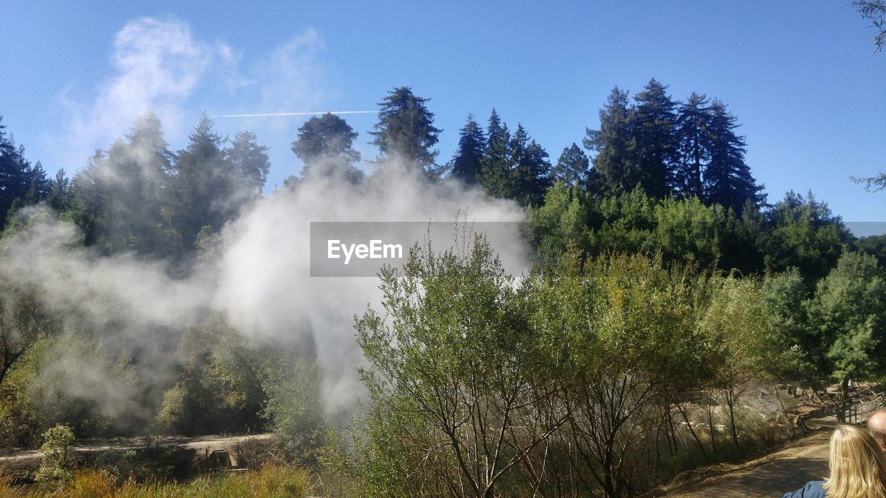 Scenic view of steam emitting for geyser