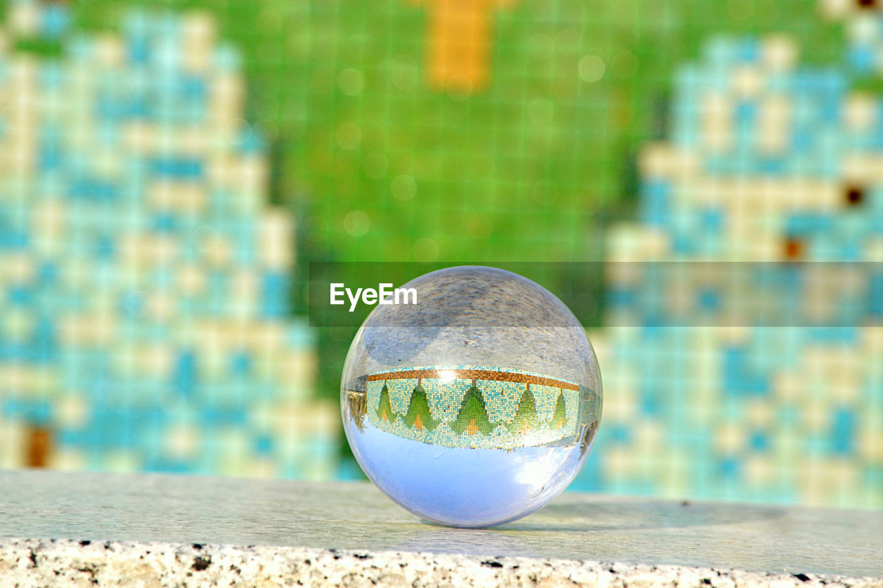 close-up of crystal ball on field