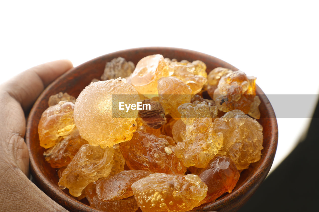 Close-up of food in bowl against white background