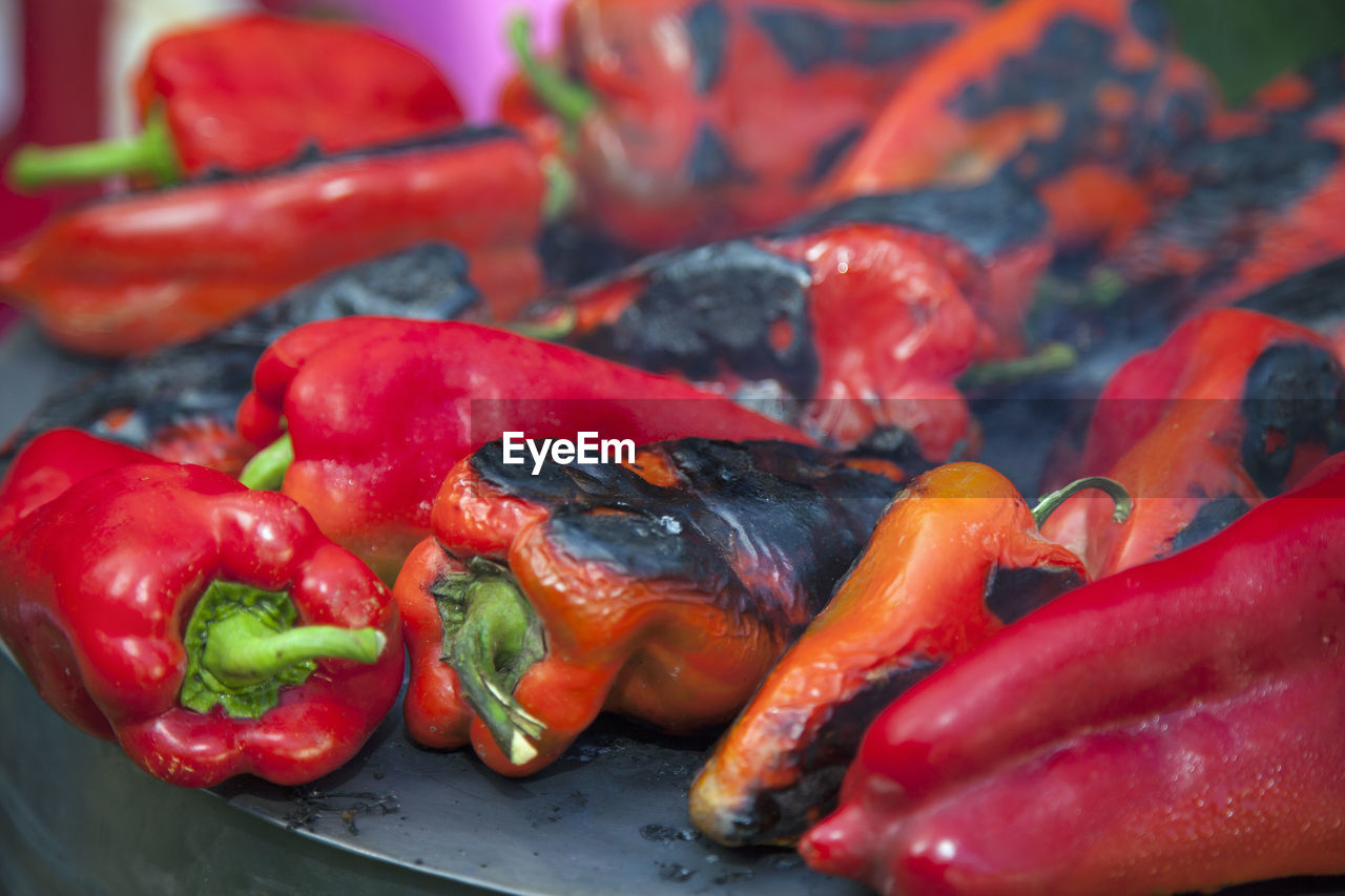CLOSE-UP OF RED CHILI PEPPERS AND VEGETABLES