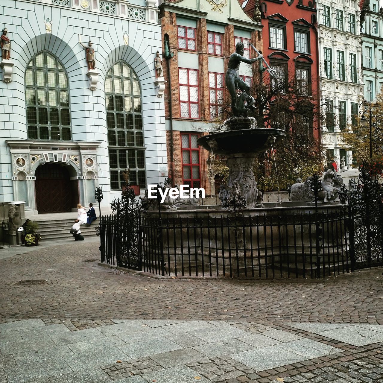 BUILDINGS BY STREET AGAINST CITY