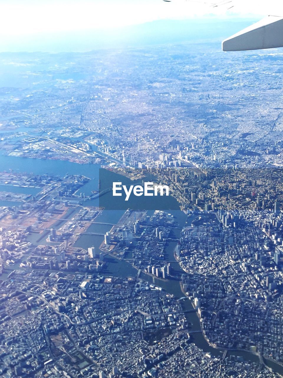 AERIAL VIEW OF CITYSCAPE AND LANDSCAPE