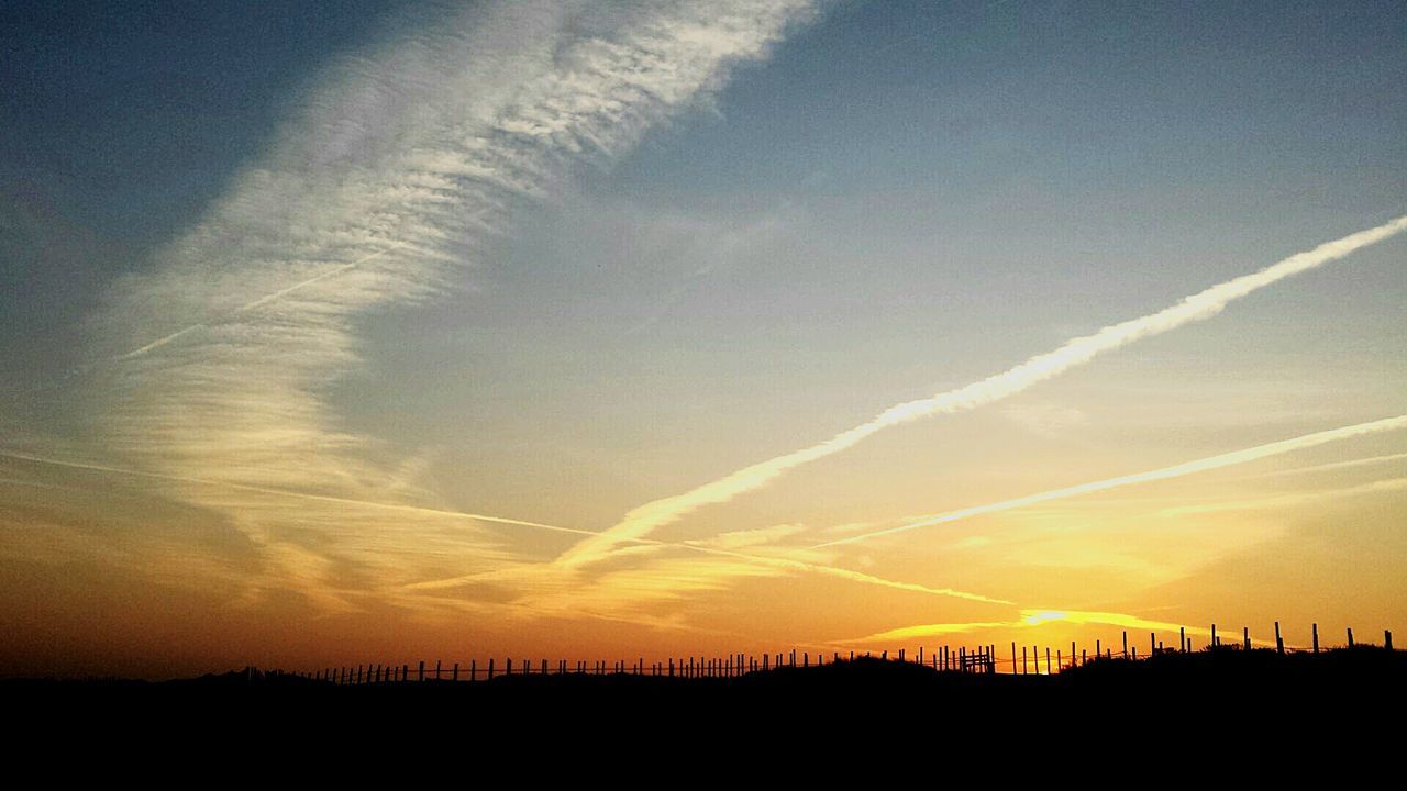 VIEW OF LANDSCAPE AT SUNSET