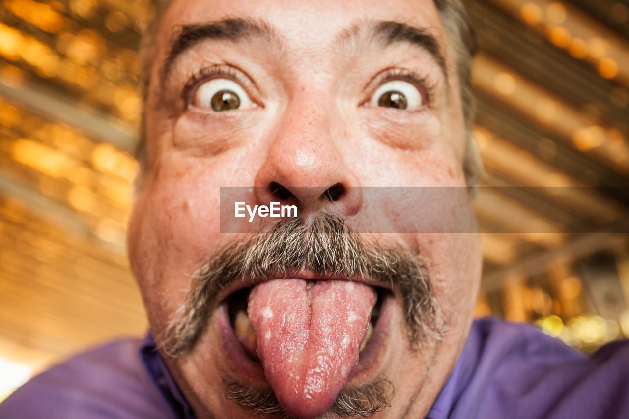 CLOSE-UP PORTRAIT OF MAN WITH FACE